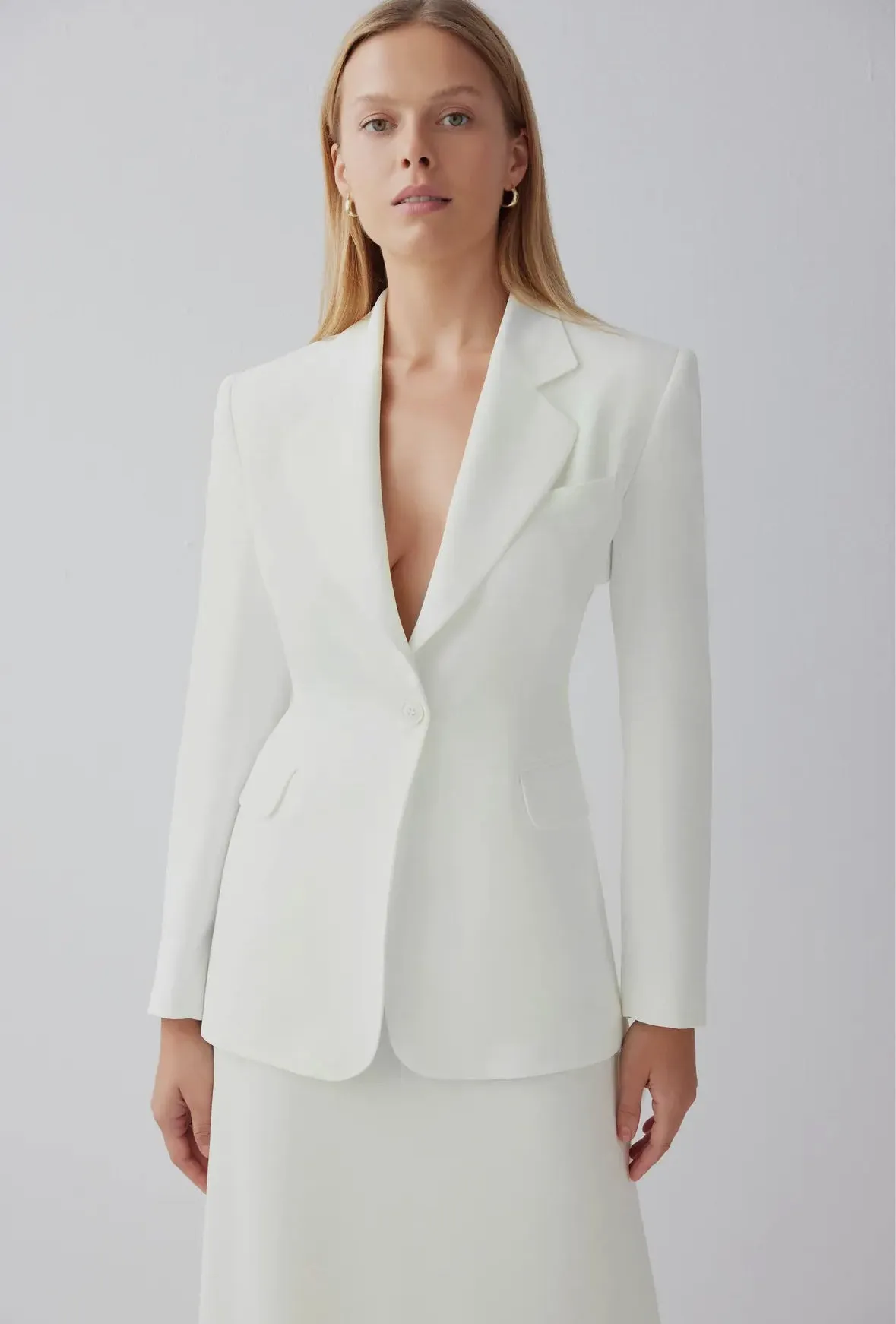 Tailored white blazer by Le Cre